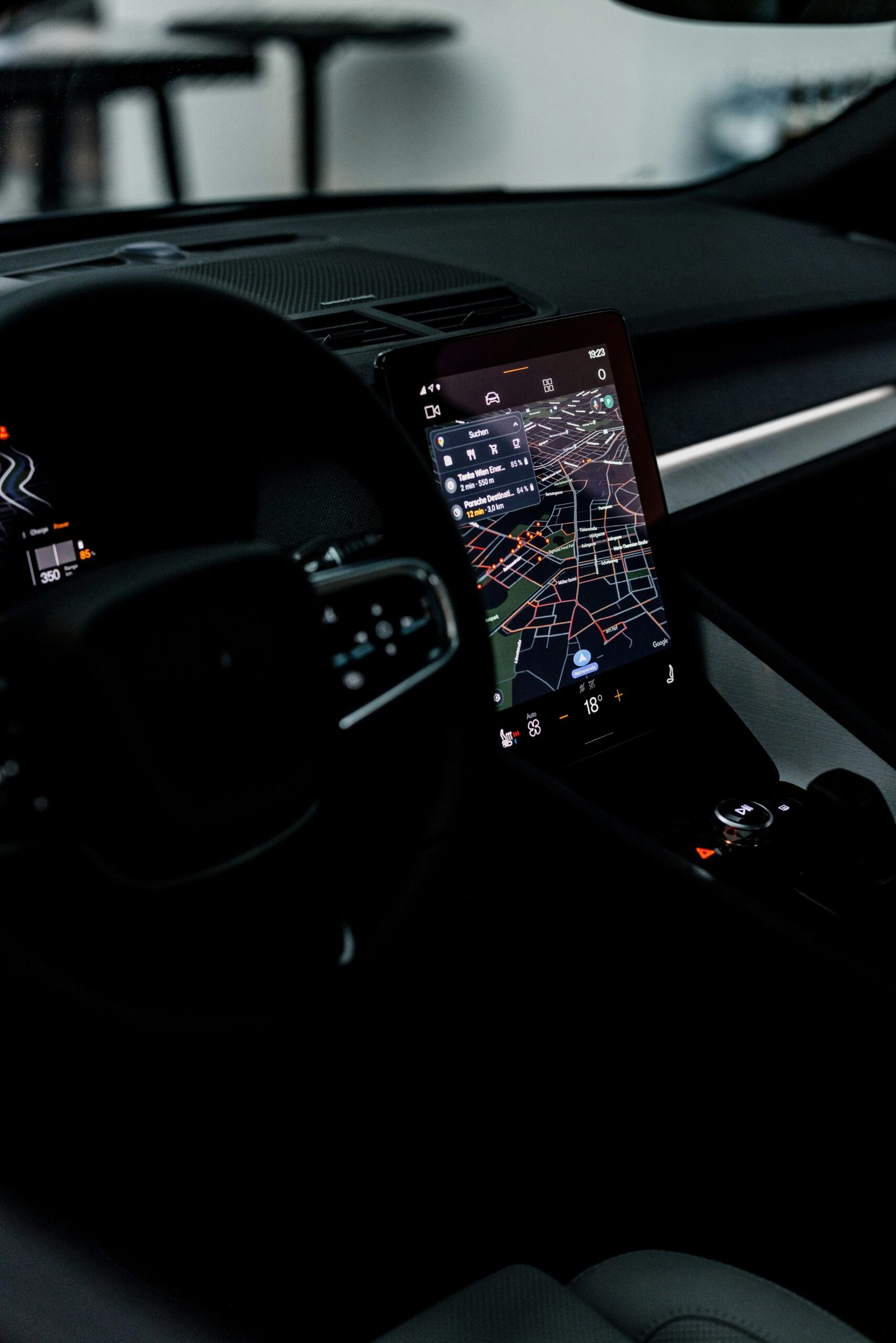 the dashboard of a car with a gps device